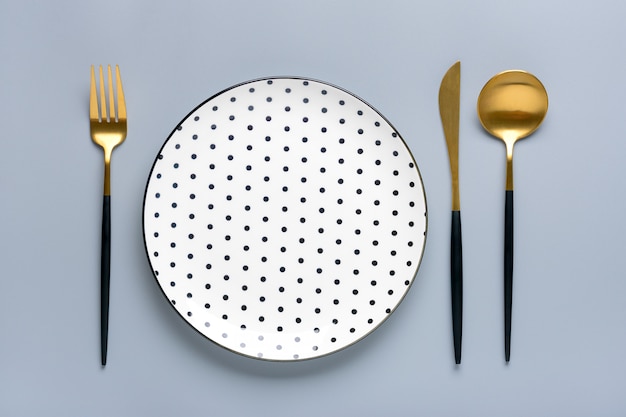 Top view of modern plate and tableware