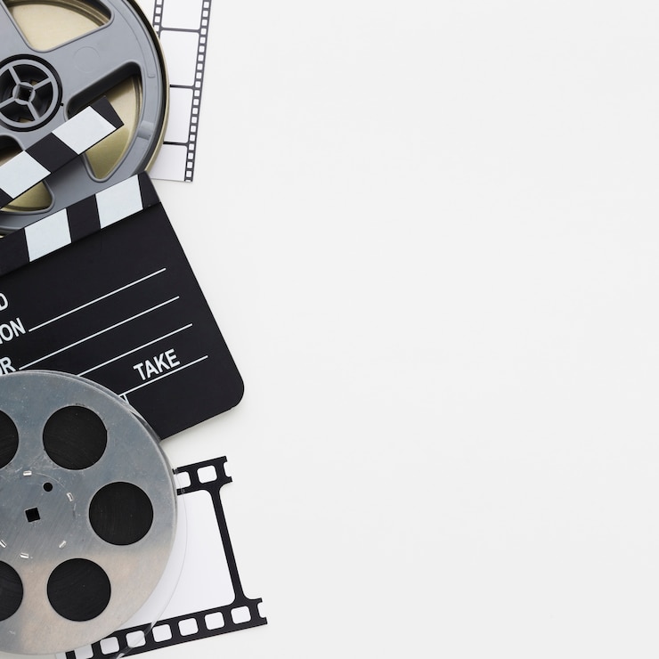 Photo top view movie elements on white background with copy space
