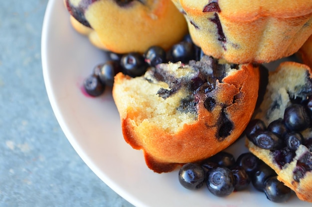 Top view Muffins with blueberries Homemade blueberry muffins with berries on a plate