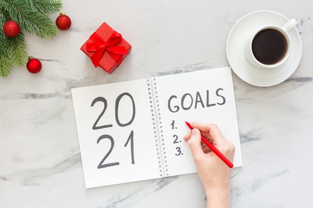 Top view new year goals list on table