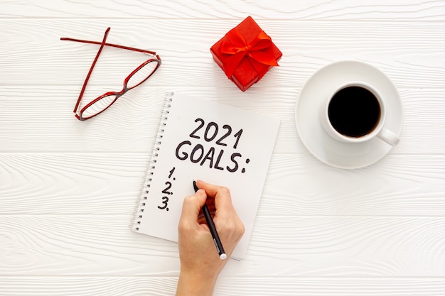 Top view new year goals list on table