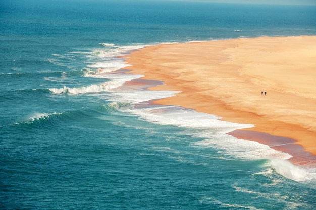 Top view of the ocean and sandy beach