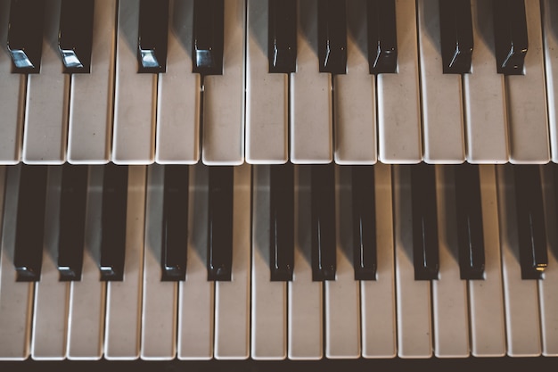 Top view old piano keyboard with old vintage tone