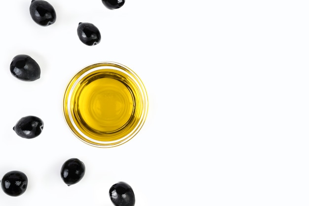 Top view organic olive oil and olives