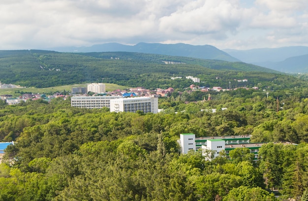 Top view of the panorama of the village of Divnomorskoye, near Gelendzhik on the Black Sea coast, sanatorium buildings and a park area