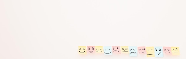 Photo top view of paper cards with various smileys on white background