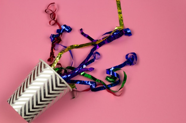 Top view paper cup and shiny confetty summer drink party concept