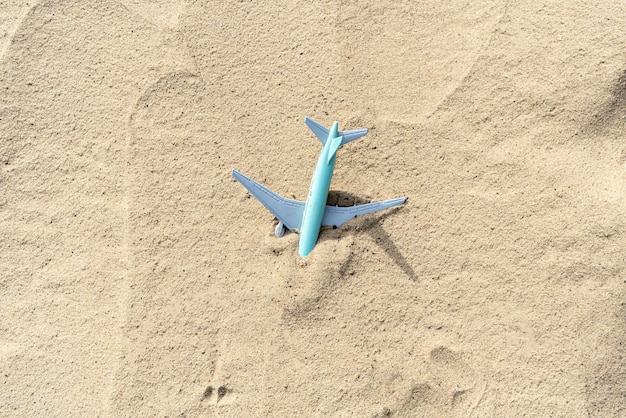 A top view of passenger aircraft crashed and abandoned in\
sahara desert