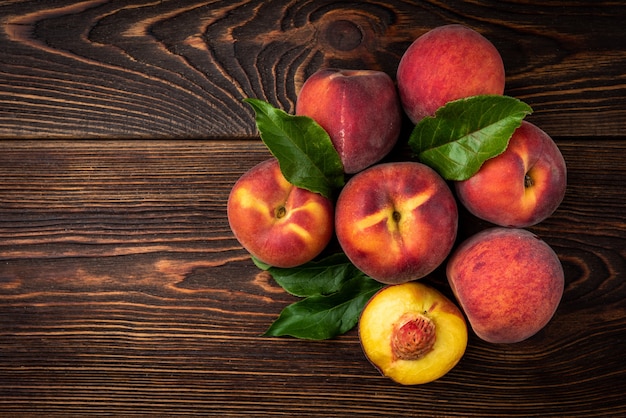 Top view peaches on table