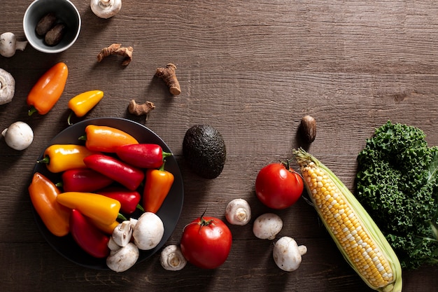 Photo top view peppers mix,  mushrooms and tomatoes