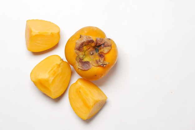 Top view of persimmon on white background