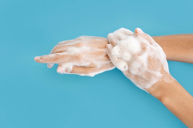 Top view person washing its hands