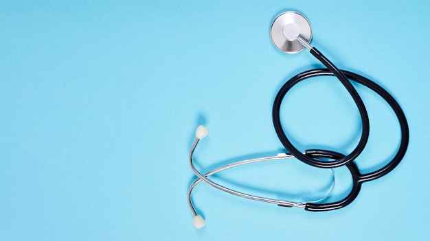 Top view of Phonendoscope or stethoscope on blue background