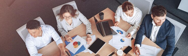 Top view photo of business people in modern it office on meeting
