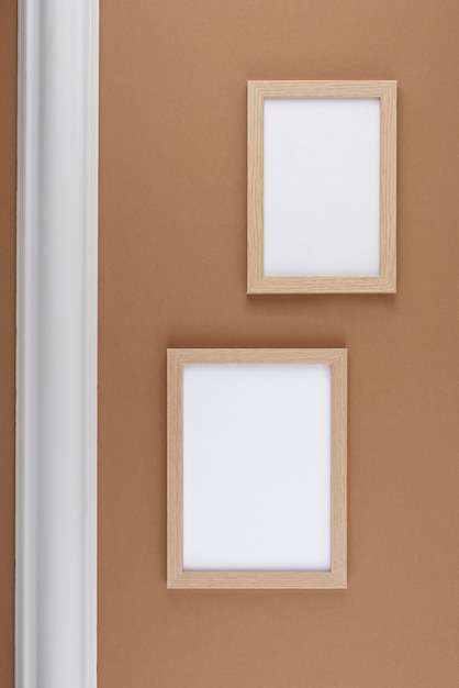 Top view of photo frames on textured surface