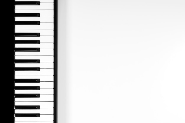 Photo top view to piano keyboard on white background