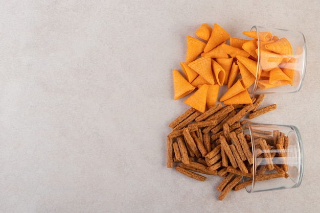 Top view of pile of appetizers on grey surface