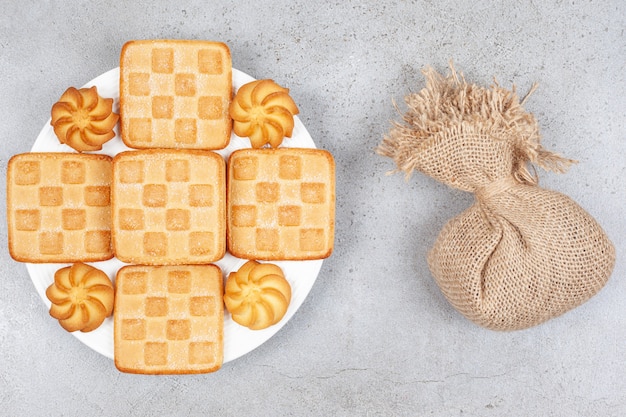 Top view of pile of biscuits  and sack 