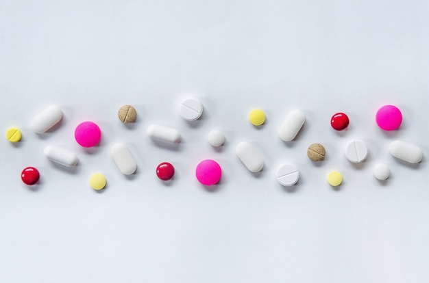 Top view of the pills on the white background