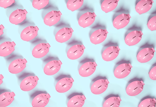 Top view of pink piggy bank patterns on blue background