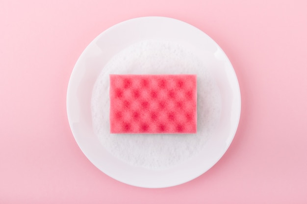 Top view pink sponge on a plate