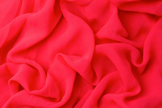 Вид сверху розовые тонированные абстрактные текстильные текстуры фона