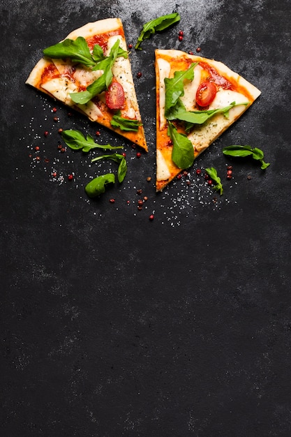 Top view of pizza slices with copy space