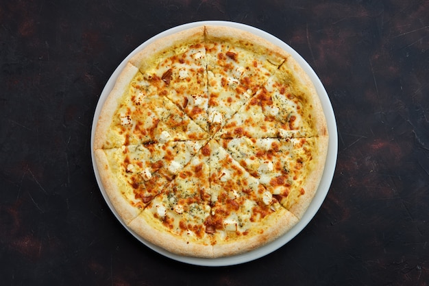 Top view of pizza with five kind of cheese