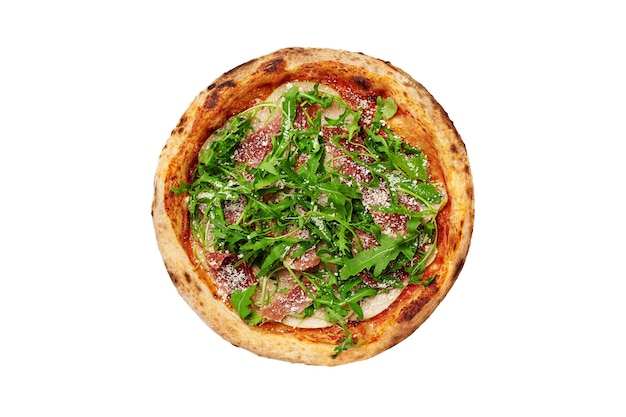 Top view of pizza with ham, pear, arugula and grated parmesan isolated on white