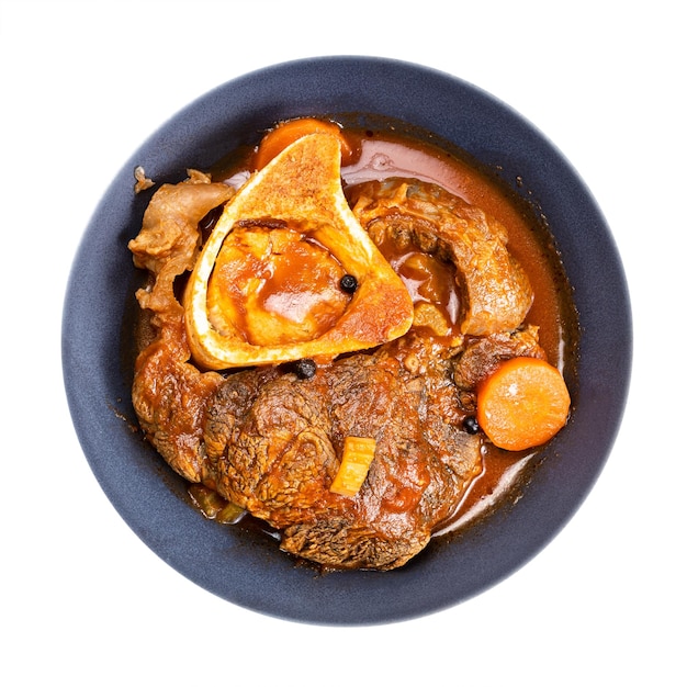 Top view of portion of ossobuco in bowl isolated