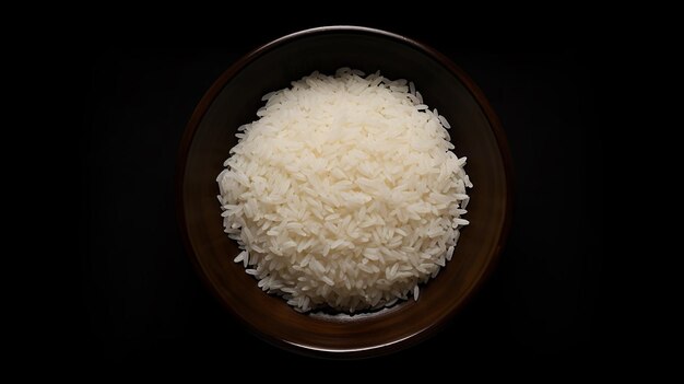 Top view rauwe rijst binnen bord op donker bureau Hoge resolutie
