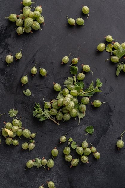 Top view of raw  gooseberry branch with leaves