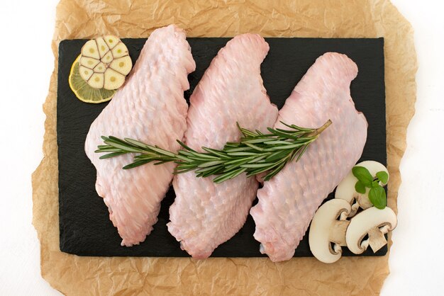 top view raw meat with rosemary