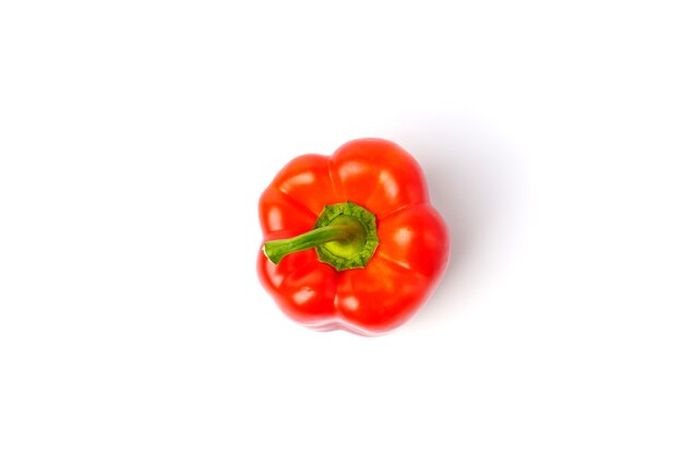 Top view of red bell pepper isolated on white background.