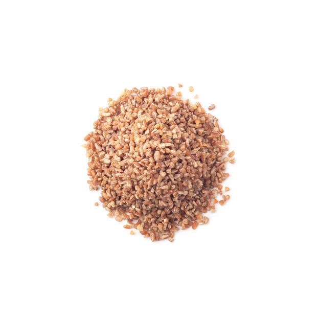 Top view of red bulgur seeds heap isolated on white background