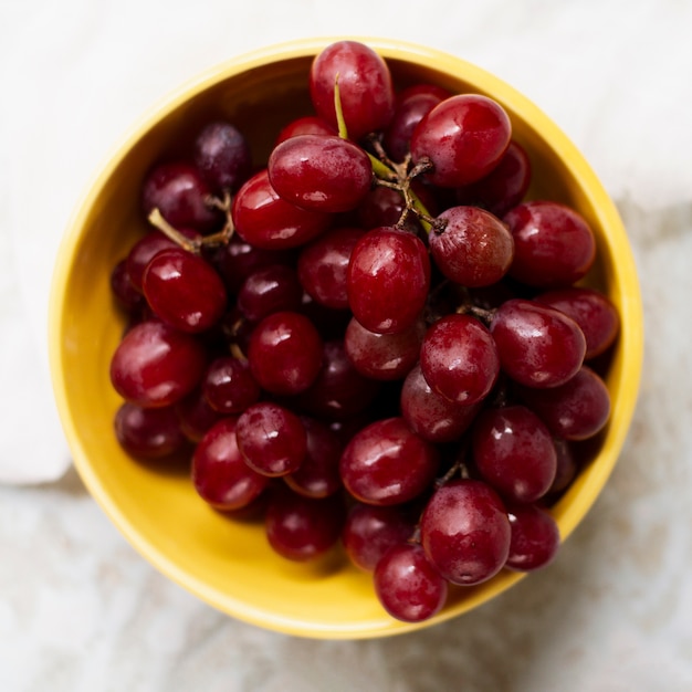 Top view red grapes in bowl