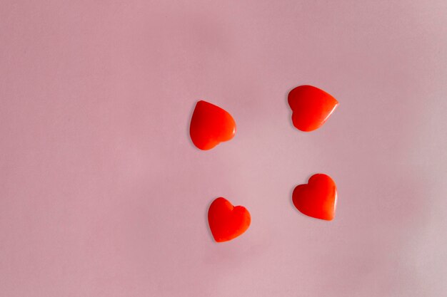 Top view of red love candies placed neatly