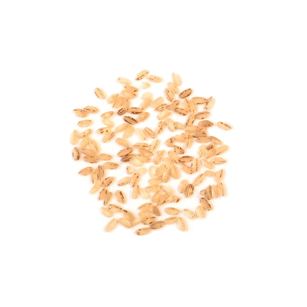 Top view of red rice grains isolated on white background