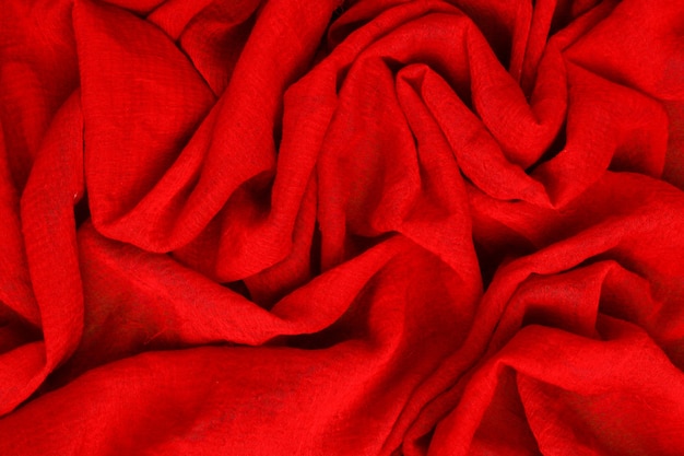 Top view red toned abstract textile texture background