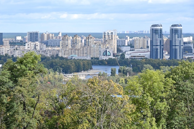 Top view of residential buildings and the Dnieper river in the city of Kyiv