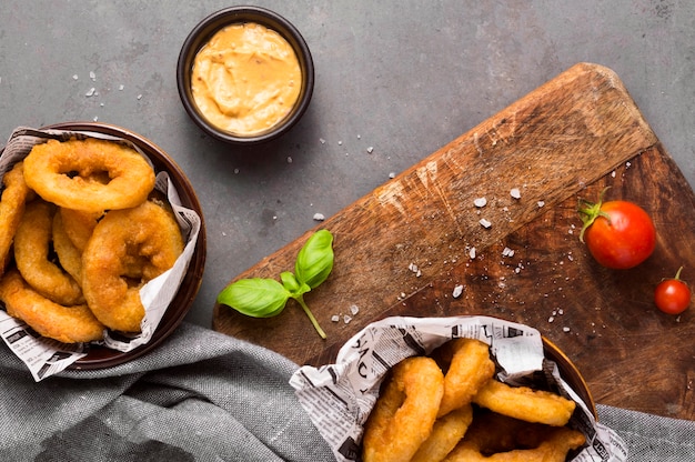 Top view of ring fries with mustard