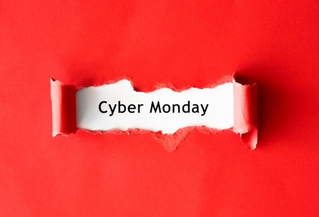 Photo top view of ripped paper for cyber monday promotion