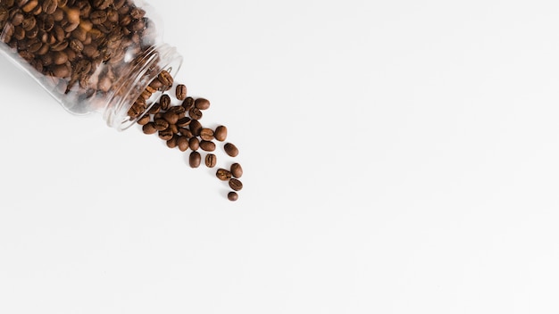 Photo top view roasted beans in a jar