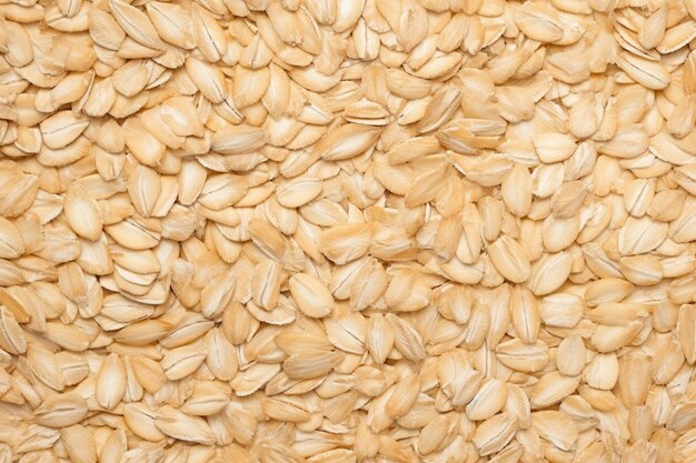 Top view of rolled oats as background