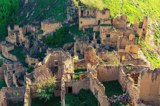 Top view of the ruins of the buildings of the uninhabited village of Gamsutl in Dagestan