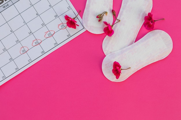 Top view sanitary towels with flowers