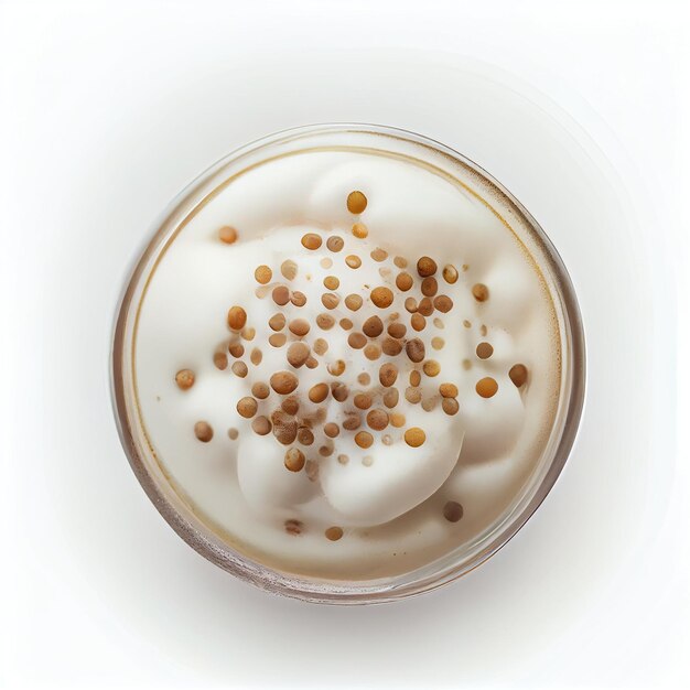 Top view selective focus of iced coffee froth in coff