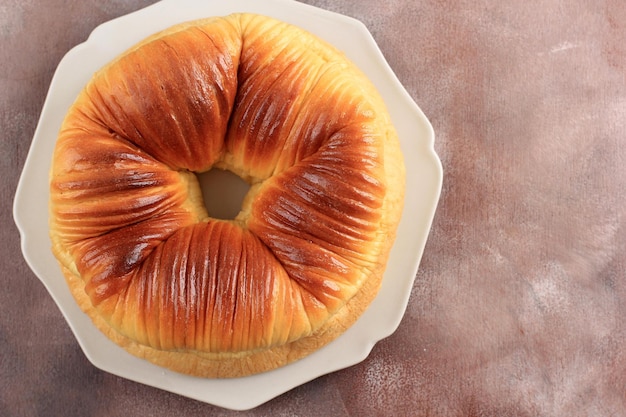 Top View Selective Focus of Wool Roll Bread, a Trending Viral Brioche Bread with Many Layer Looks Like Wool. Copy Space for Text, Advertisement, or Recipe