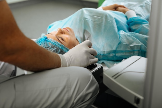 Top view of a serious nice woman during the eyesight examination