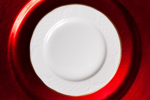 Top view set of empty plates red and white